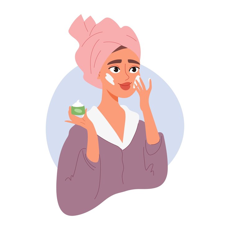 Vrouw met handdoek op het hoofd past crème op haar gezicht schoonheidsbehandeling en zelfzorgconcept