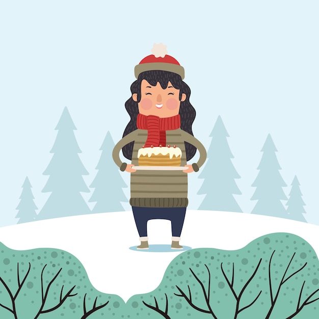 Vrouw met taart in sneeuwlandschap