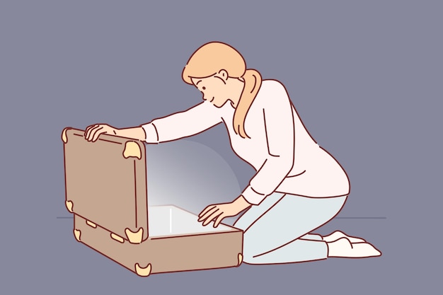 Vrouw opent grote koffer en ziet gloed voor concept van het ontdekken van schat met waardevolle spullen
