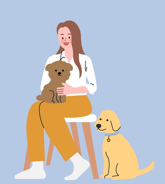 Vrouw zit met haar honden.