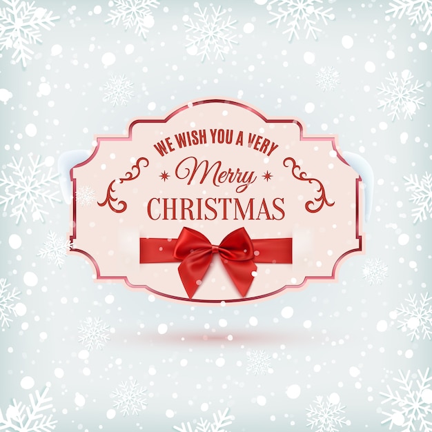 Мы желаем вам счастливого рождества, богато украшенного баннера с красной лентой и бантом на зимнем фоне со снегом и снежинками.