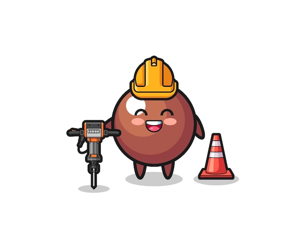 Wegenwerker mascotte van chocolade bal met boormachine, schattig design