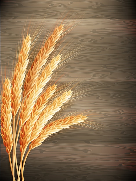 Пшеница на деревянных фоне.