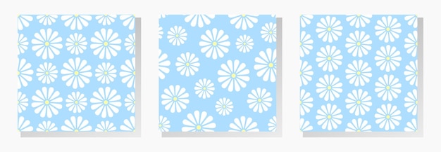 White chamomiles flowers on blue background Floral vector seamless patterns collection