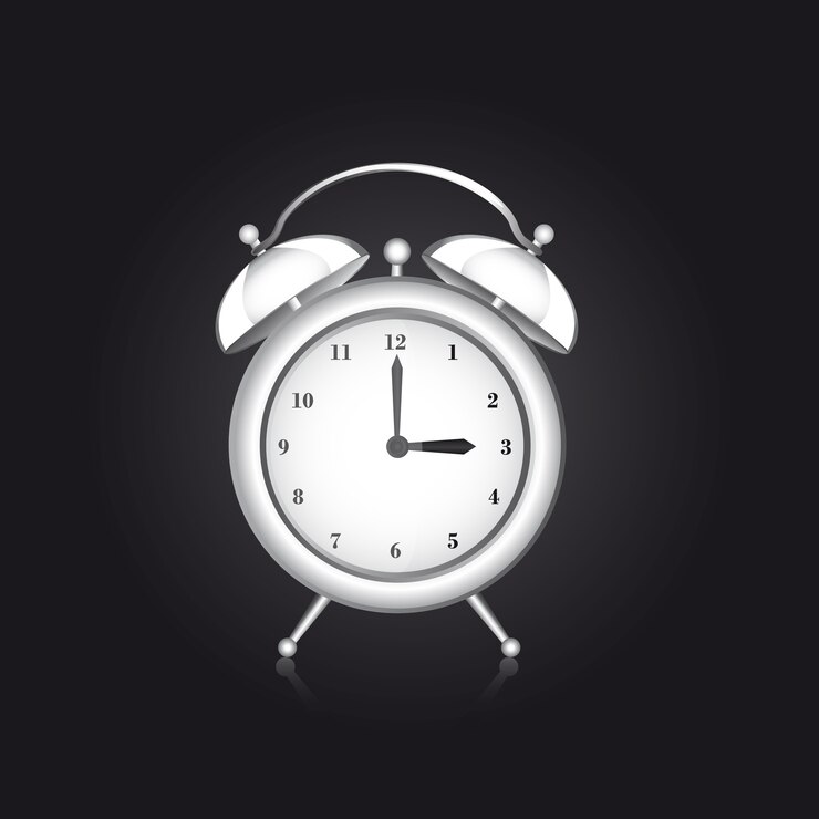 Vector white clock alarm over black background vector illustration