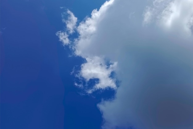 white clouds against blue sky