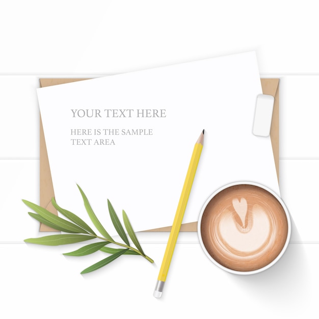 White composition paper with coffee and tarragon leaf on wooden background