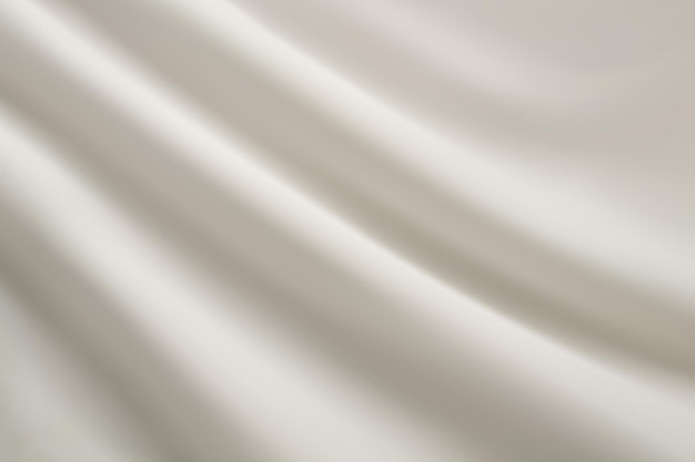 White fabric texture with gentle diagonal folds closeup