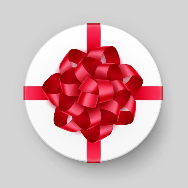 White Round Gift Box with Shiny Red Scarlet Bow and Ribbon Top View Close up Isolated on Background