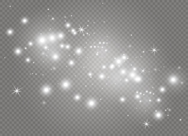 白い火花と金色の星が特別な光の効果を輝きます。透明な背景の上で輝きます。クリスマスの抽象的なパターン。輝く魔法の塵粒子