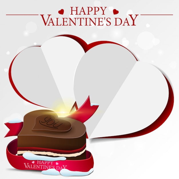 チョコレート菓子と白いバレンタインのグリーティングカード