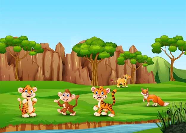 Wild animal cartoon playing and enjoying on the field