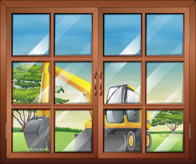 A window with a view of the bulldozer outside