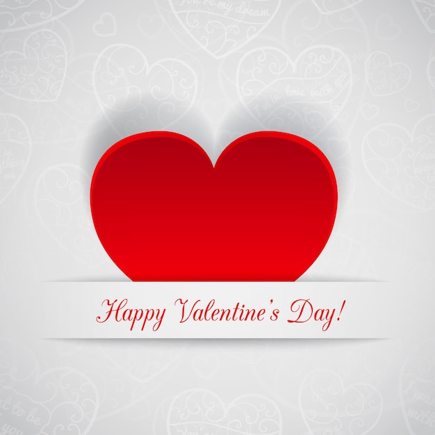 Witte kaart voor Valentijnsdag met rood papieren hart