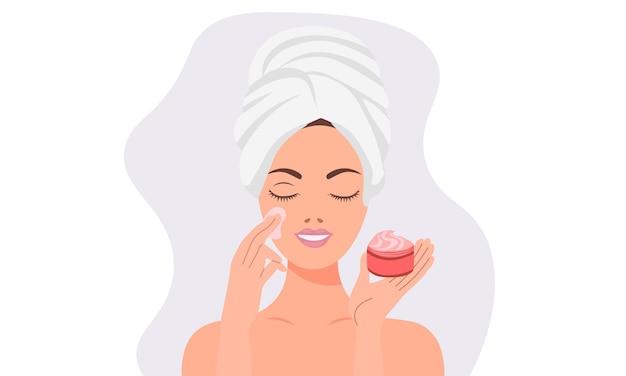 woman applying cream on her face