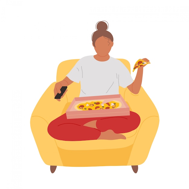 Woman in armchair eating pizza