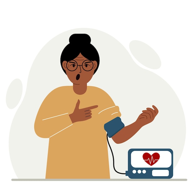 La donna controlla il concetto di assistenza sanitaria per la pressione sanguigna misurazione della pressione sanguigna tonometro digitale monitoraggio della salute
