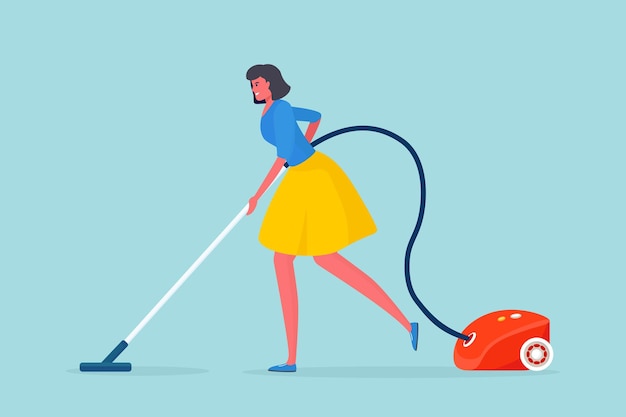 Woman cleaning floor with vacuum cleaner