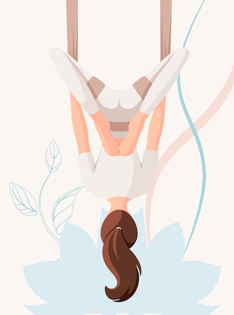 Una donna fa aero yoga