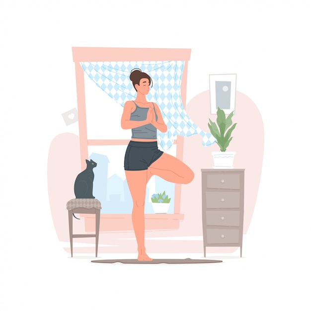 Woman doing yoga in morning at home