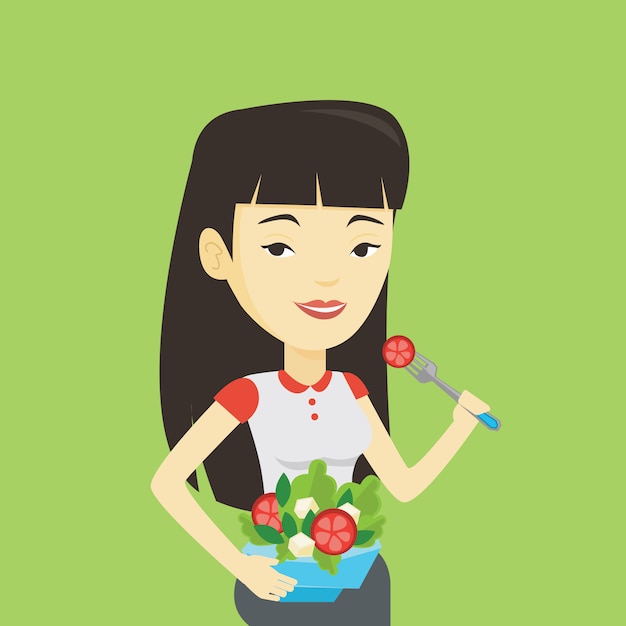 Woman eating healthy vegetable salad.