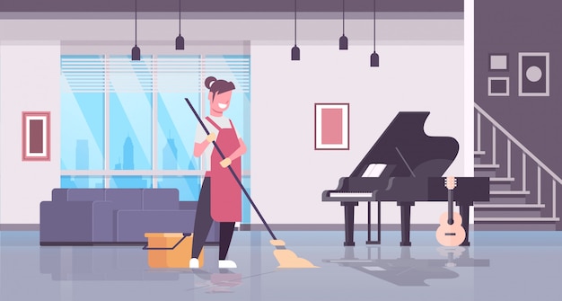 woman in gloves and apron washing floor girl using mop housewife doing housework cleaning concept modern living room interior 