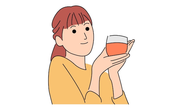 Woman hold a cup of orange juice