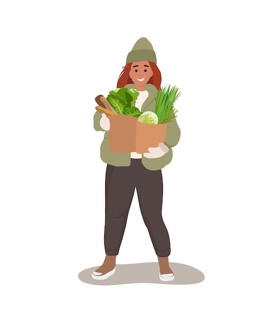 Женщина держит и несет бумажный пакет с овощами