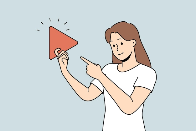 Woman holding play button suggesting start video or music from playlist and use multimedia technology Girl points finger at large play sign designed to control media player or online cinema