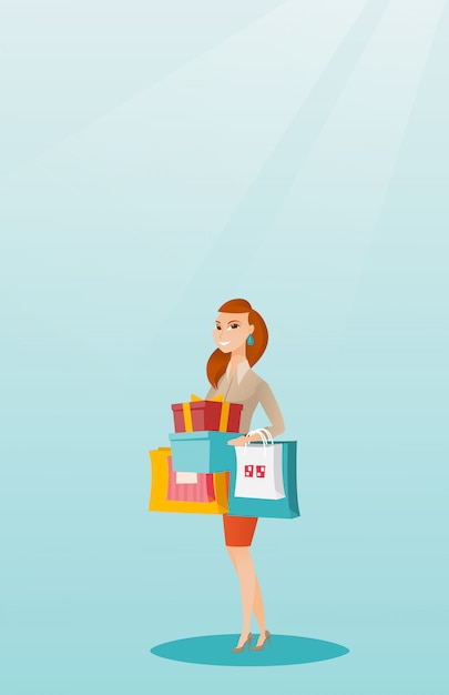 Woman holding shopping bags and gift boxes.