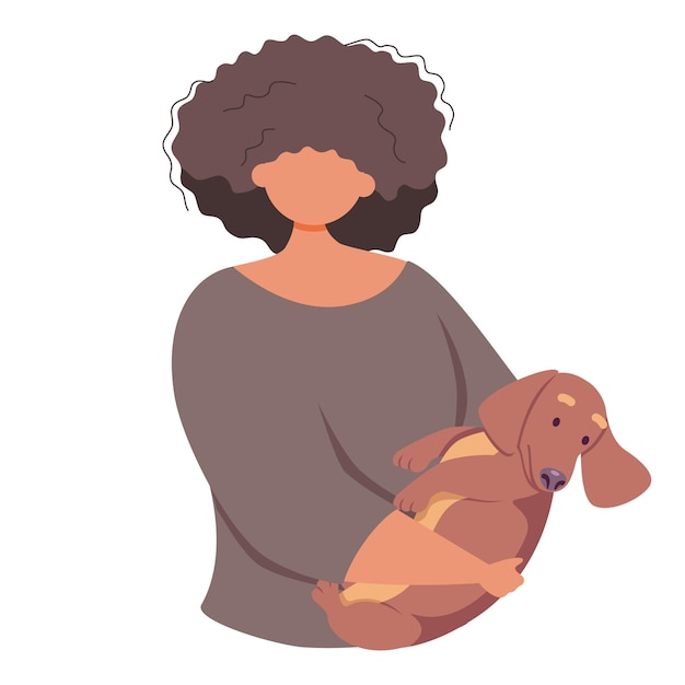 Woman holding a small dog in her arms