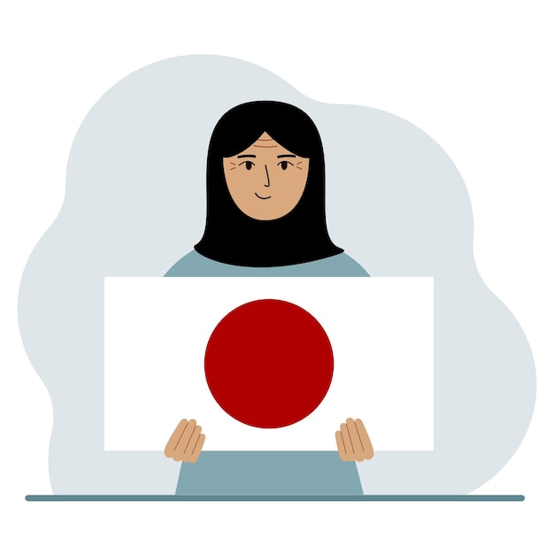 女性が日本の国旗を手に持っているデモンストレーションの国民の祝日や愛国心のコンセプト