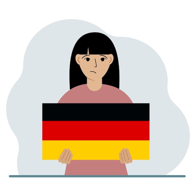 Женщина держит в руках немецкий флаг Концепция демонстрации национального праздника или патриотизма Национальность