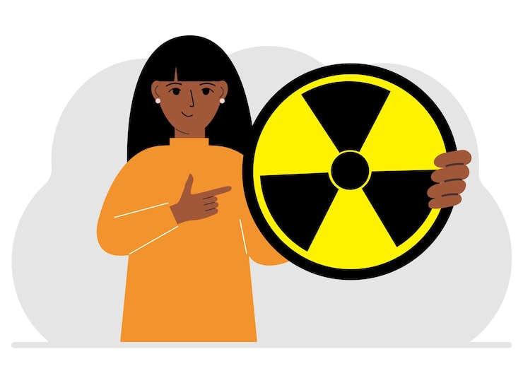 Vector a woman holds in his hand a large sign warning about radiation danger vector flat illustration