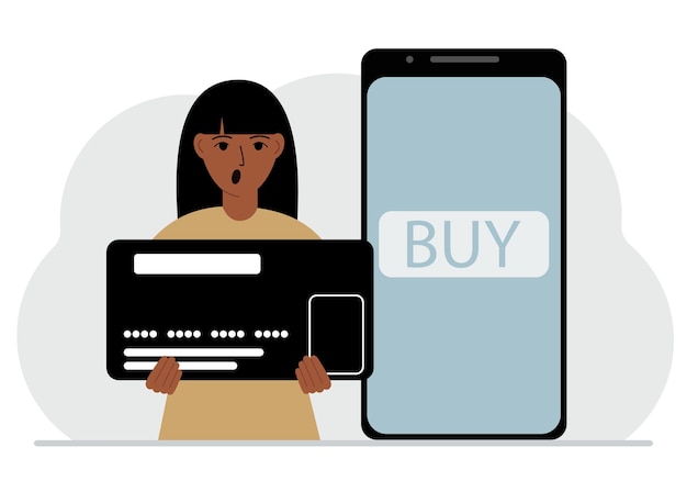 A woman holds a huge credit card next to a smartphone with a Buy button on the screen The concept of online payments with payment via mobile phone