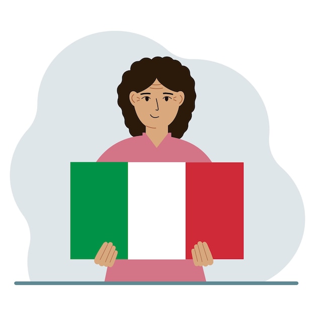 A woman holds an Italian flag in his hands The concept of demonstration national holiday or patriotism