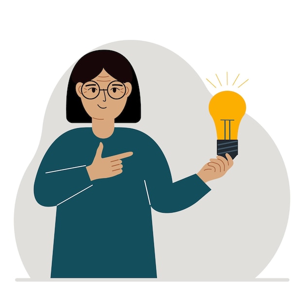 A woman holds a light bulb in his hand idea concept brainstorming business thinking solution eureka task bingo or answer search