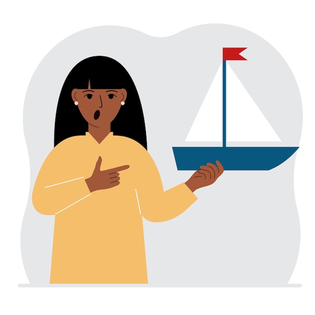 Una donna tiene in mano uno yacht a vela concetti di libertà speranza e grandi progetti hobby sport o affari