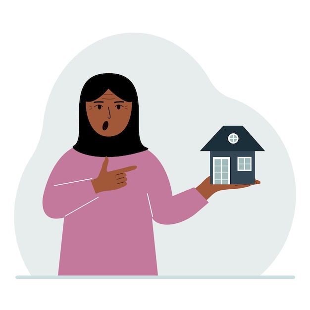 A woman holds a small house in his palm Concepts of inheritance real estate transfer mortgage credit loan or house purchase