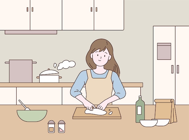 Una donna sta cucinando in cucina
