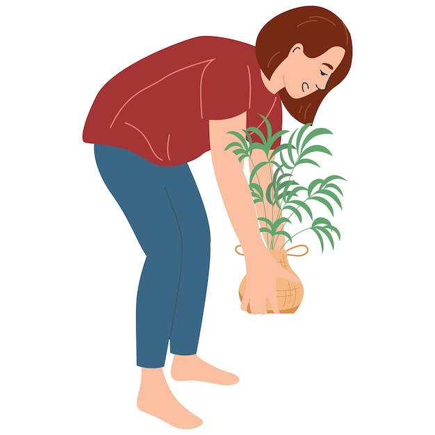 A woman lifts a flower pot.