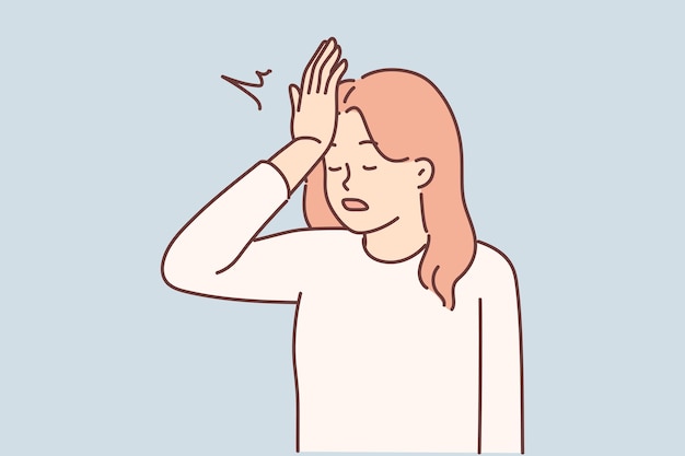 Woman makes gesture with facepalm putting palm to forehead having learned about mistake made