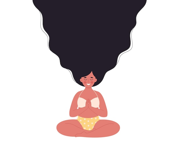 ヨガマットで蓮のポーズで瞑想する女性健康的なライフスタイルヨガリラックス呼吸運動