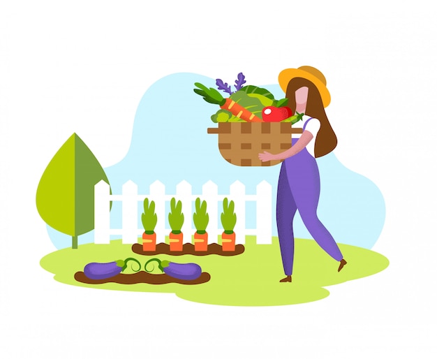 Woman in overalls with basket fresh vegetables