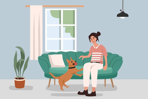 Woman playing with her dog on the sofa