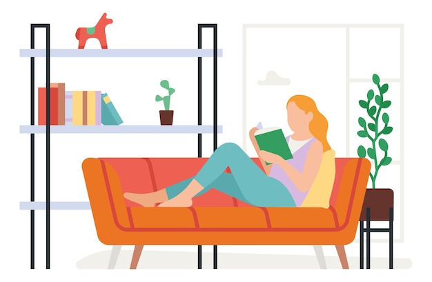 ソファで本を読む女性 家の余暇時間