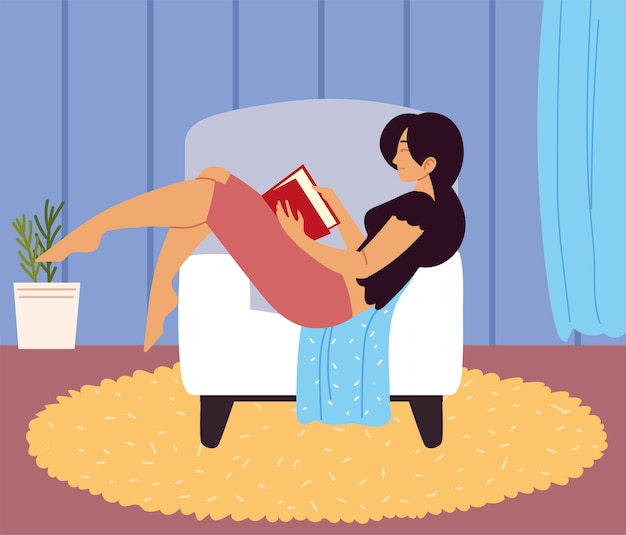 部屋で教科書を読んでいる女性
