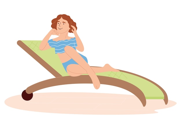woman relaxing on a deckchair at the beach