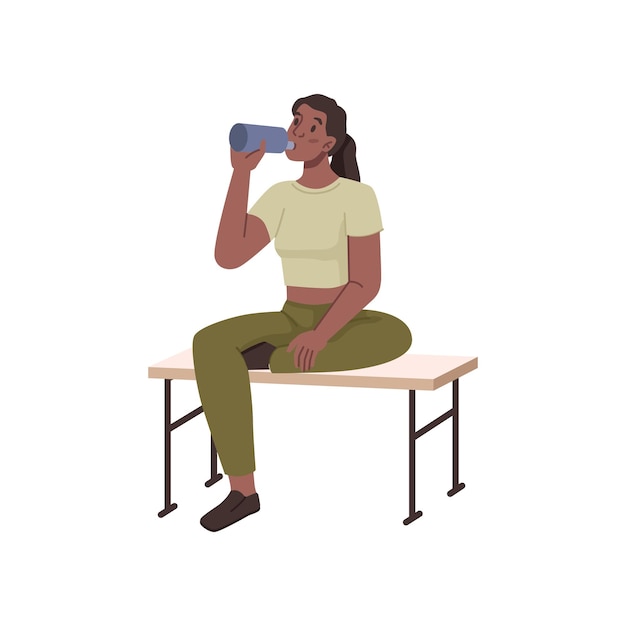 Woman resting from working out drink water