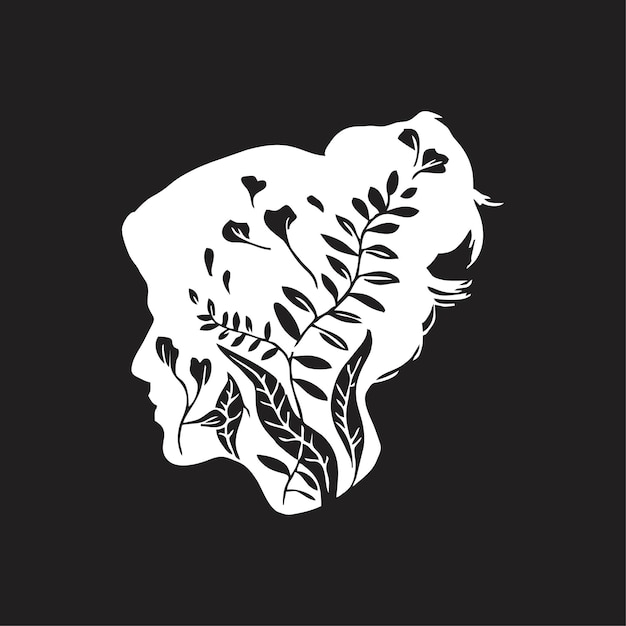 Woman's face silhouette decorated with flowers and leaves